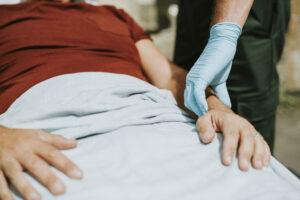Closeup of a patient on an ambulance stretcher